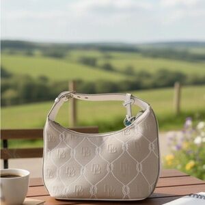 Dooney & Bourke shoulder bag, specifically a vintage-style Hobo Bucket Bag.